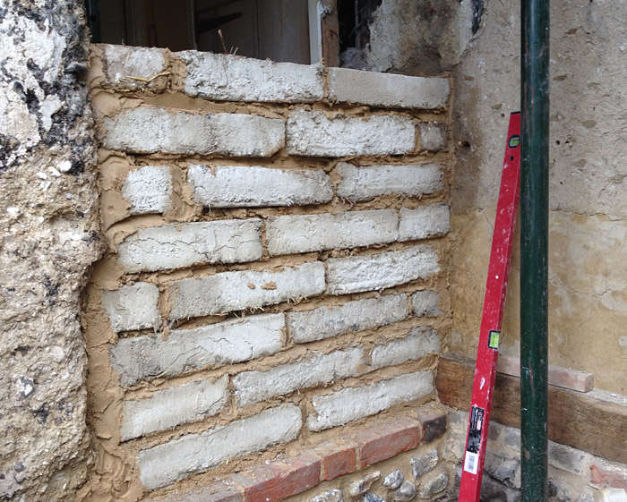 Clay brick wall under restoration
