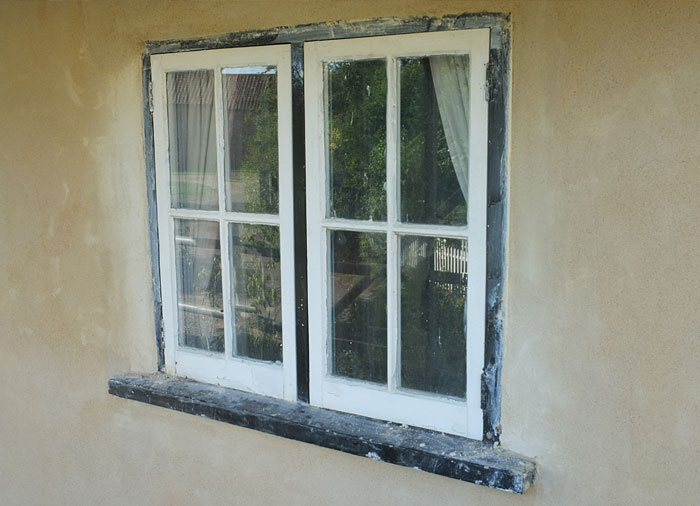 Windows in rendered wall
